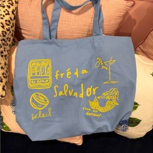 NWOT Freda Salvador Sky Blue Tote with Yellow Graphics